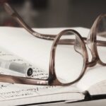 Glasses on notebook - A Lucky Fellow post featured image